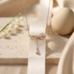Zircon Embedded Rose Gold Bow & Teardrop Necklace - Image 5