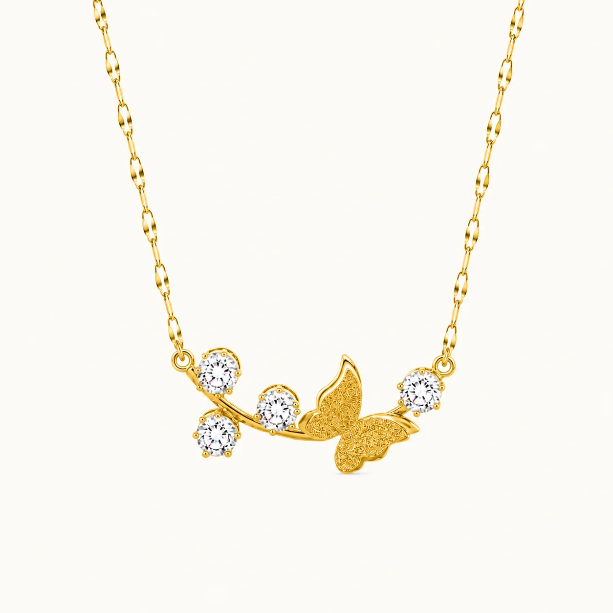 Butterfly Branch Gold Pendant Necklace with textured gold butterfly and sparkling round crystal accents on a delicate gold chain