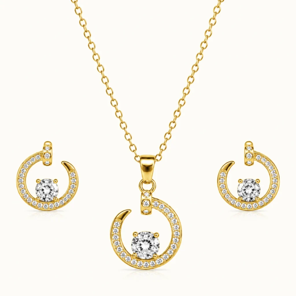 Celestial Halo Jewelry Set featuring a gold-finish open-circle pendant with a brilliant center stone and matching halo stud earrings