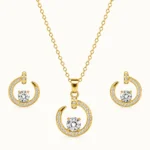 Celestial Halo Jewelry Set featuring a gold-finish open-circle pendant with a brilliant center stone and matching halo stud earrings