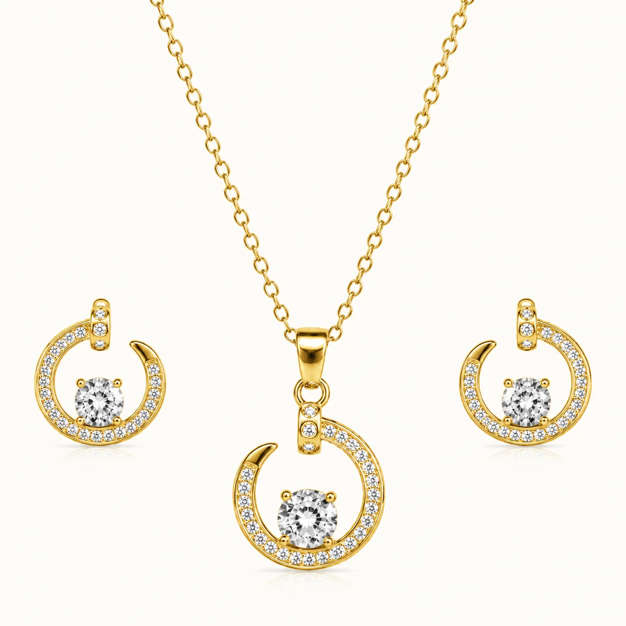 Celestial Halo Jewelry Set featuring a gold-finish open-circle pendant with a brilliant center stone and matching halo stud earrings