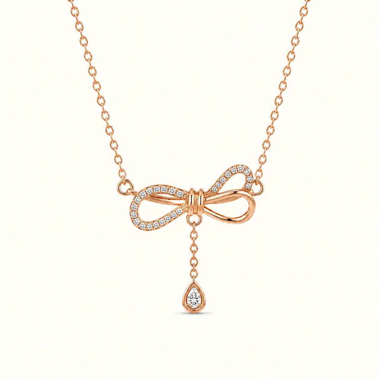 Divayra Zircon Embedded Rose Gold Bow & Teardrop Necklace