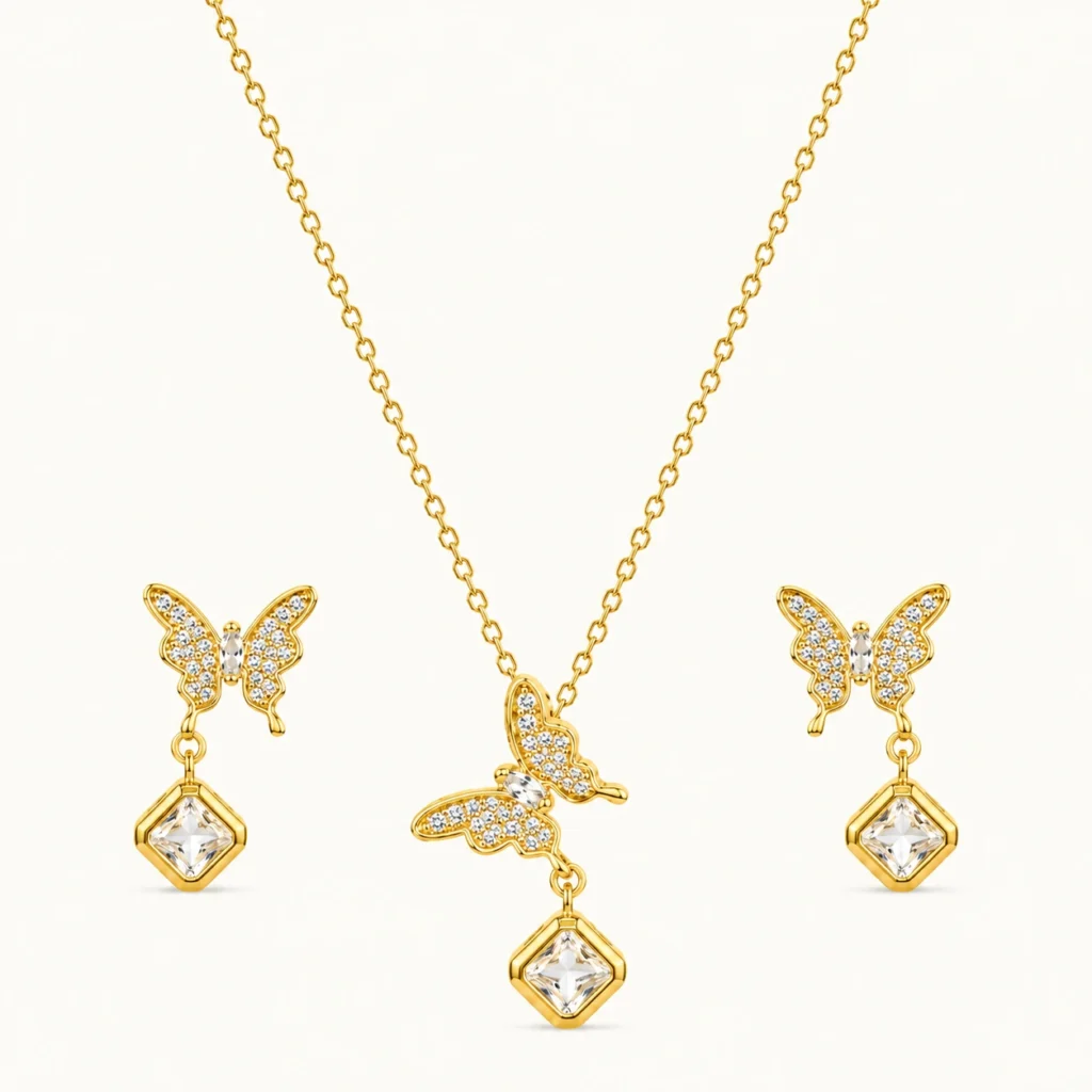 FlutterAura Butterfly Jewelry Set with sparkling butterfly pendant, geometric crystal drop, matching butterfly earrings, and polished gold finish