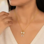 Gold Bow Drop Pendant Necklace - Image 2
