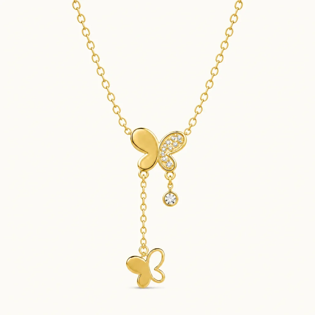 Gold Butterfly Drop Necklace with cubic zirconia butterfly wing, dangling crystal accent, and cascading butterfly charm