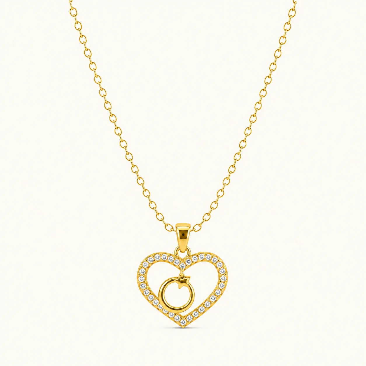 Gold Heart Charm Pendant Necklace with sparkling pavé stones and dangling circular charm in polished yellow gold finish