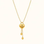 Gold Heart Tassel Pendant Necklace with layered heart pendant and dangling heart charm tassels in polished yellow gold finish