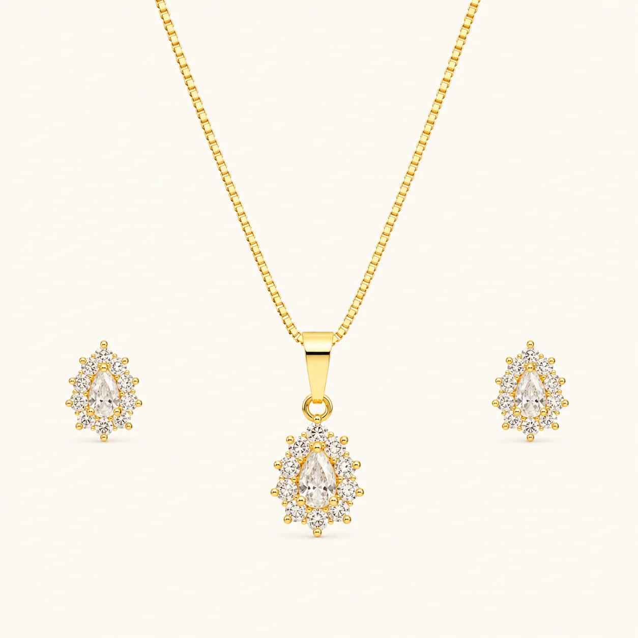 Pear Cut Crystal Jewelry Set featuring a gold pendant necklace and matching pear-shaped stud earrings with brilliant halo crystals