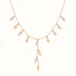 Rose Gold Leaf Drop Necklace with marquise cubic zirconia stones and cascading leaf charms in a delicate nature-inspired design