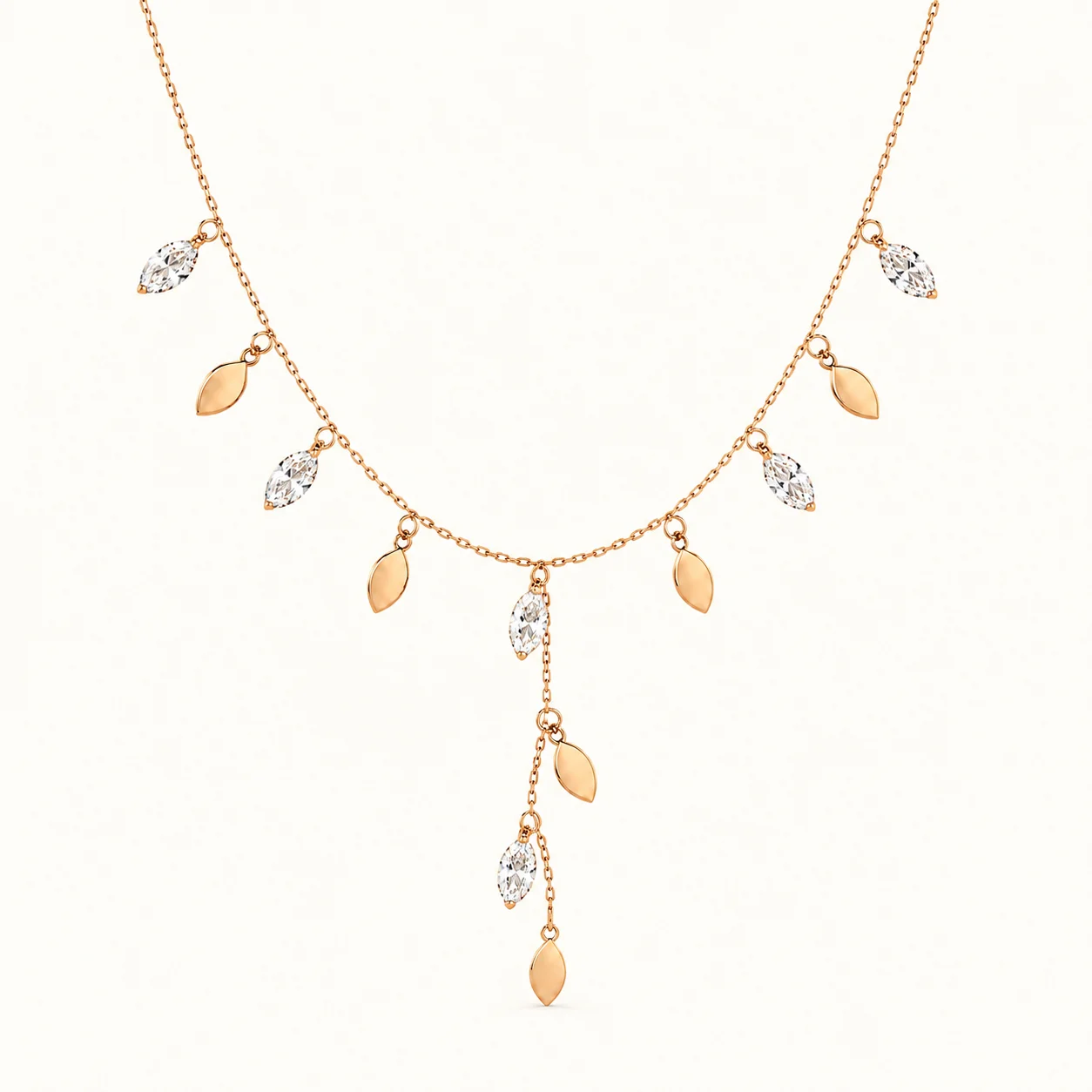 Rose Gold Leaf Drop Necklace with marquise cubic zirconia stones and cascading leaf charms in a delicate nature-inspired design Rose Gold Leaf Drop Necklace with marquise cubic zirconia stones and cascading leaf charms in a delicate nature-inspired design