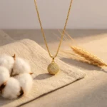 Divayra Aurelia Pave Sphere Box Chain Necklace with clear CZ crystal ball pendant and polished gold-tone Venetian chain (2)