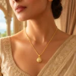 Divayra Aurelia Pave Sphere Box Chain Necklace with clear CZ crystal ball pendant and polished gold-tone Venetian chain (2)