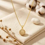 Divayra Aurelia Pave Sphere Box Chain Necklace with clear CZ crystal ball pendant and polished gold-tone Venetian chain (2)