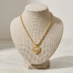 Divayra Aurelia Sunburst Heart Popcorn Chain Necklace with textured gold-tone pendant and clear pavé CZ centre