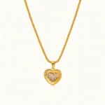 Divayra Aurelia Sunburst Heart Popcorn Chain Necklace with textured gold-tone pendant and clear pavé CZ centre