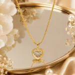 Divayra Aurelia Sunburst Heart Popcorn Chain Necklace with textured gold-tone pendant and clear pavé CZ centre