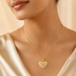 Divayra Avelisse Quilted Heart Box Chain Necklace with clear CZ stones and a polished gold-tone lattice pendant (6)
