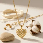 Divayra Avelisse Quilted Heart Box Chain Necklace with clear CZ stones and a polished gold-tone lattice pendant (6)