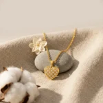 Divayra Celestia Quilted Heart Curb Chain Necklace with clear CZ stones and polished gold-tone lattice pendant (2)