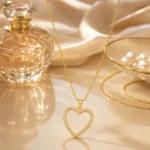 Divayra Seraphine Pave Open Heart Cable Chain Necklace with clear CZ stones and polished gold-tone oval links