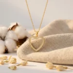 Divayra Seraphine Pave Open Heart Cable Chain Necklace with clear CZ stones and polished gold-tone oval links