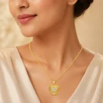 Divayra Solara Radiant Heart Box Chain Necklace with sunburst-textured gold-tone pendant and clear pavé CZ heart centre