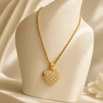 Divayra Veloura Quilted Heart Rope Chain Necklace with clear CZ stones and a polished gold-tone lattice pendant (2)