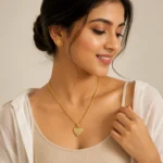 Divayra Veloura Quilted Heart Rope Chain Necklace with clear CZ stones and a polished gold-tone lattice pendant (2)