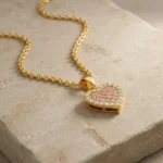 Rose Eclat Pink Heart Curb Chain Necklace with blush-pink pavé CZ stones, clear crystal halo and polished gold-tone links (6)