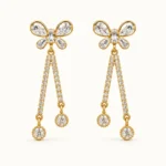 ButterflyLuxe Crystal Chain Drop Earrings with sparkling butterfly tops, crystal-lined chains, round crystal charms, and gold finish