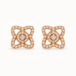 Rose Gold Pavé Floral Stud Earrings featuring an open-cut four-petal design with clear pavé crystals and a central stone